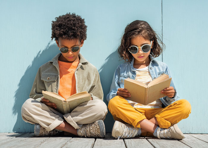 boy and girl reading books